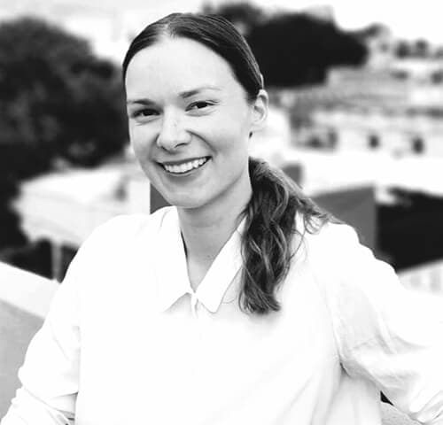 A professional headshot of a woman