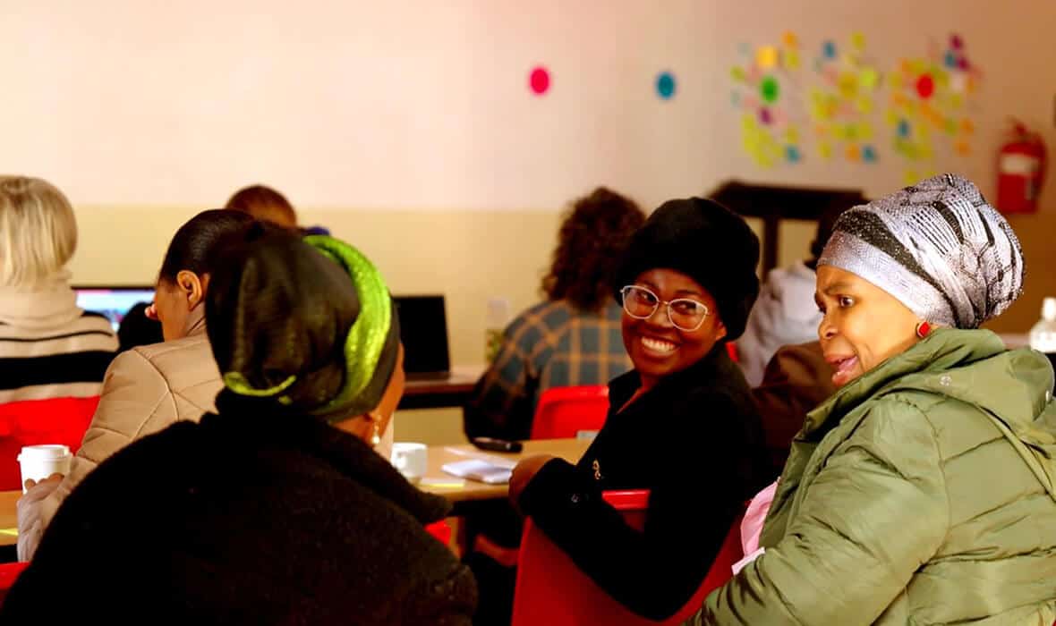 Women networking in community workshop