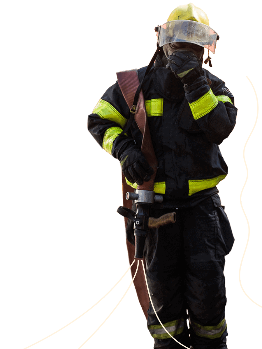 Firefighter in protective gear and helmet, emergency response, firefighting safety.